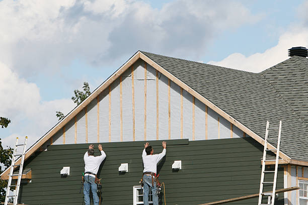 Professional Siding Contractor technician working in Spencer, IN